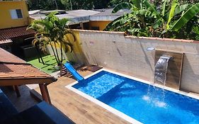 Casa com Jacuzzy aquecida e Piscina, próxima a praia ideal para famílias e casais